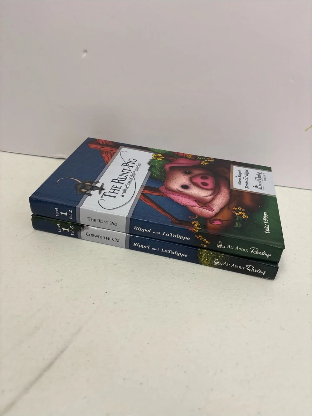 The Runt Pig & Cobweb Cat by Marie Rippel All About Reading Level 1 Vol. 2 & 3
